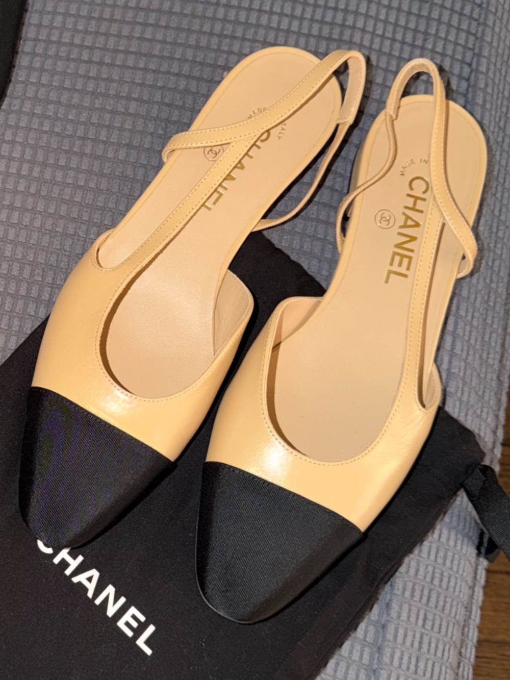 CHANEL Goatskin Grosgrain Cap Toe CC Slingback Flats in Beige Black